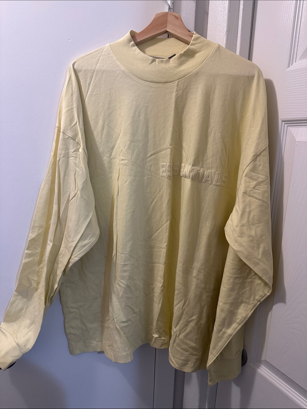 Essentials Men’s Long-Sleeve Tee in Light Yellow
